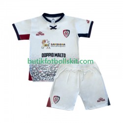 Cagliari Barn Borta Matchtröja 2025/26 Kortärmad